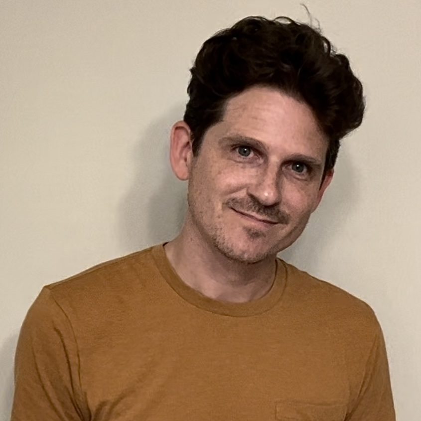 Headshot of Tom Doran.